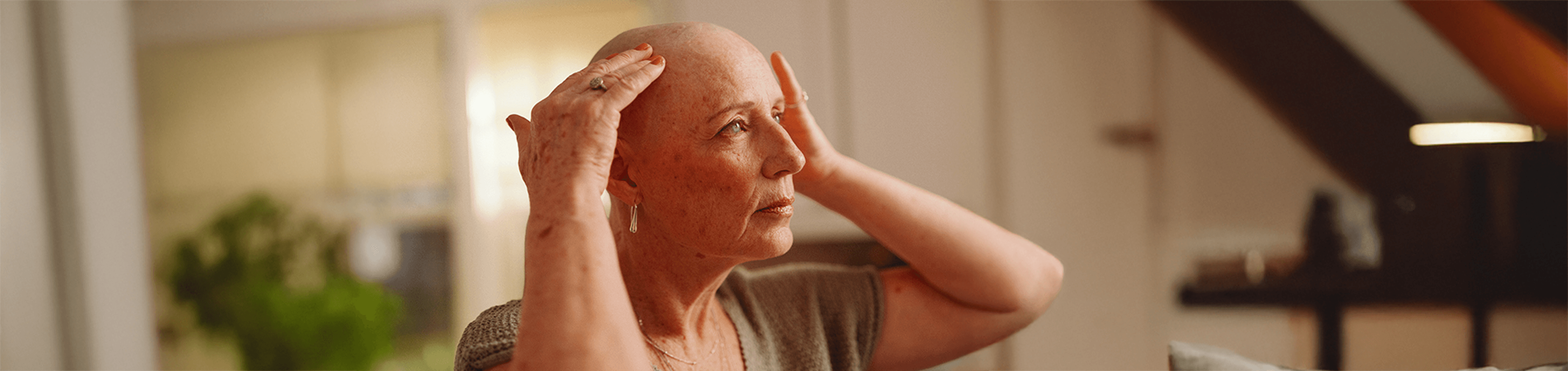 Kathy gently massaging her scalp.